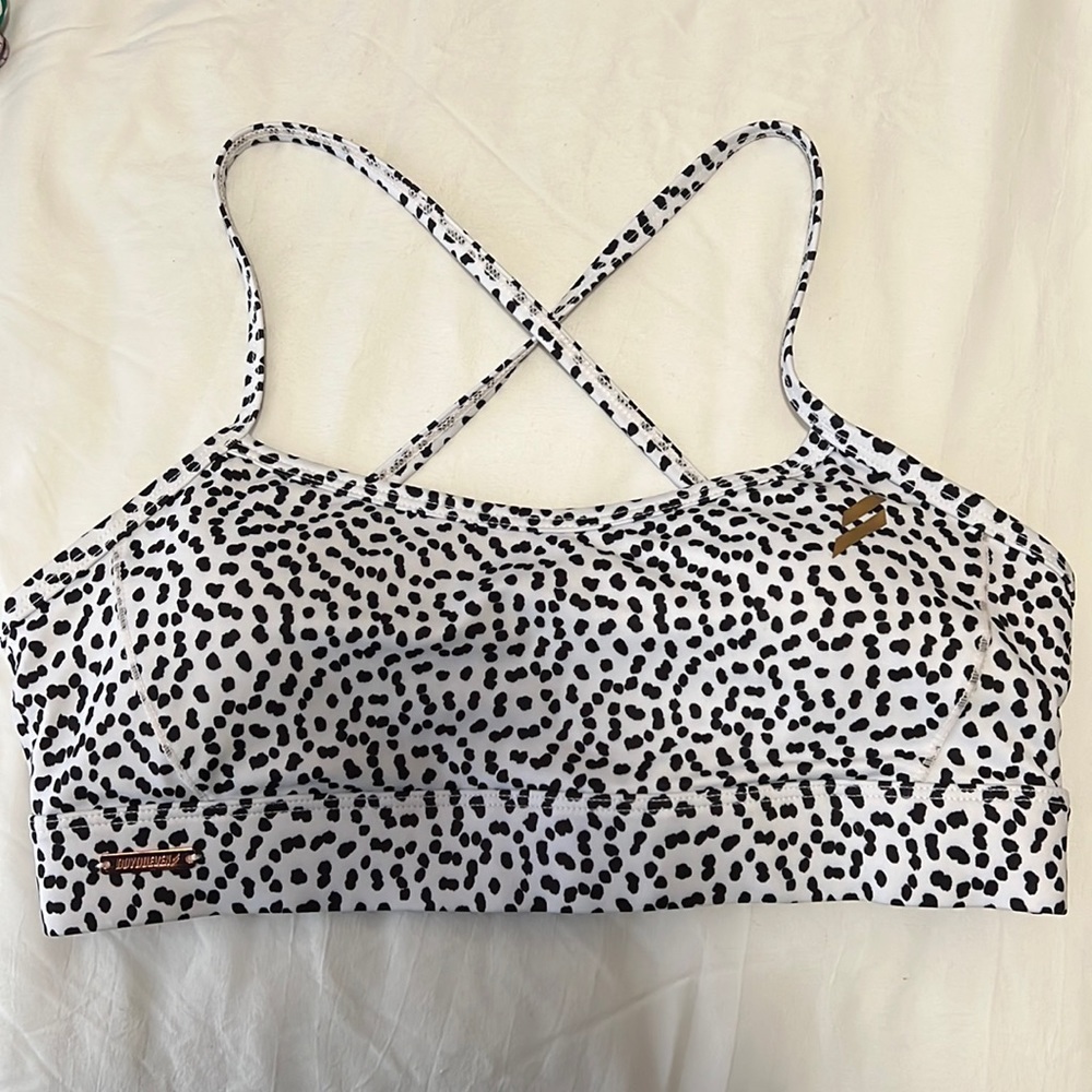 DOYOUEVEN speckled excel polka dots sports bra